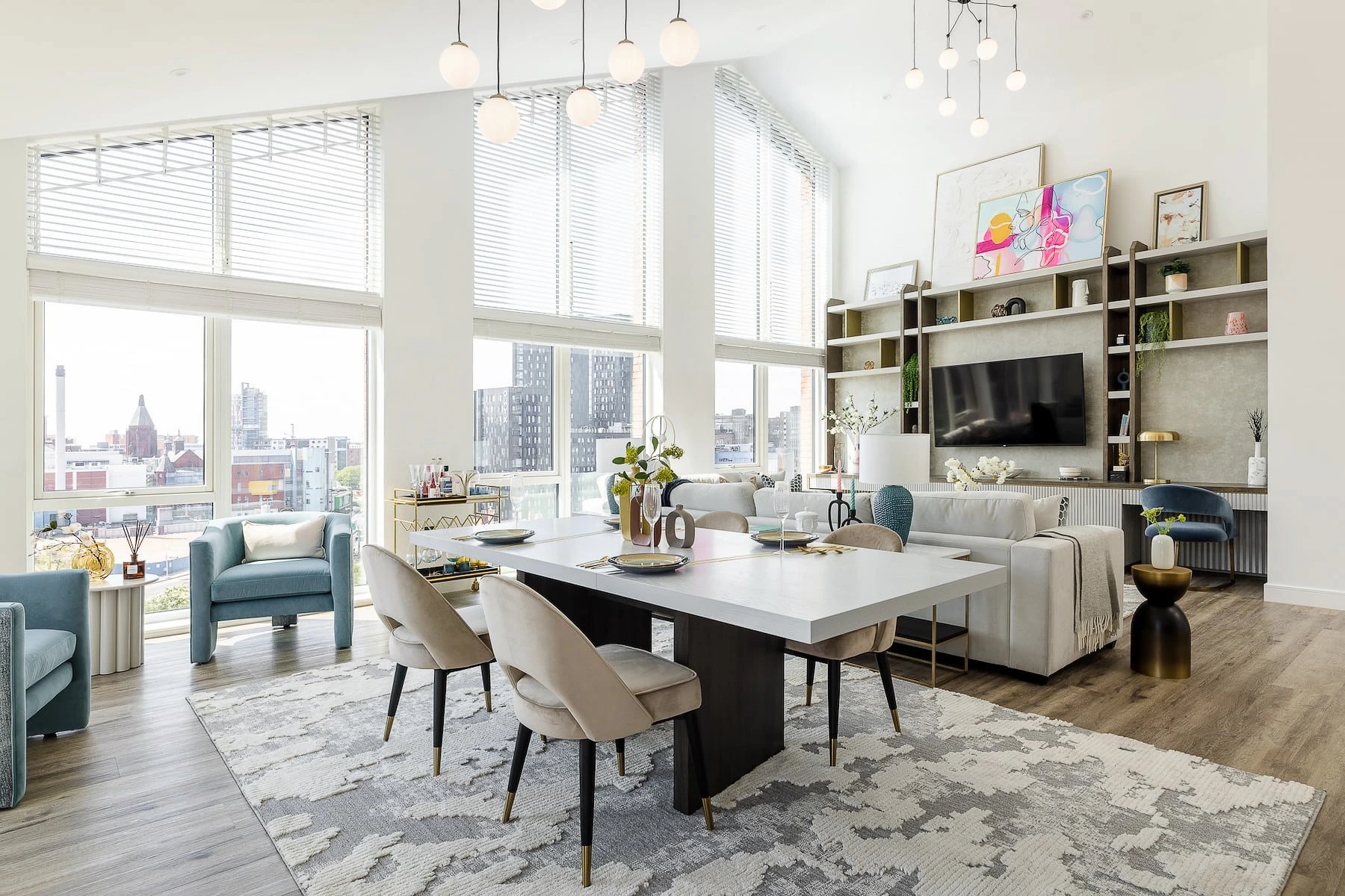A bright open-plan apartment living and dining room